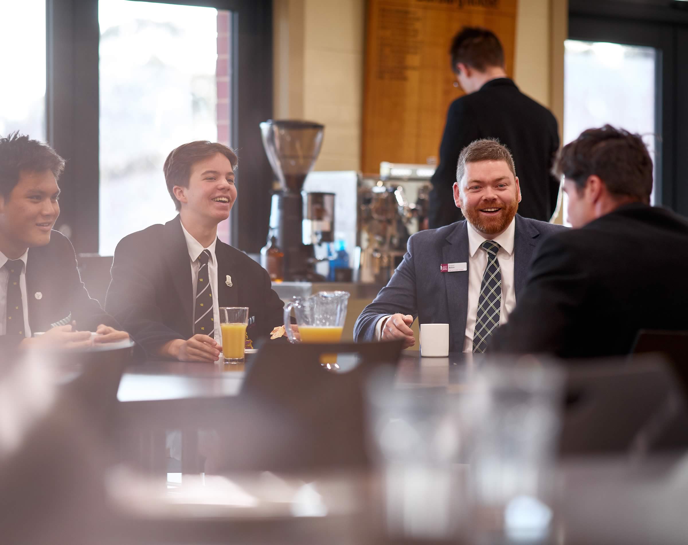 Mr Fraser Bolton, Head of Boarding, with students in Burbury House (boarding). Image: Joshua Lamont.