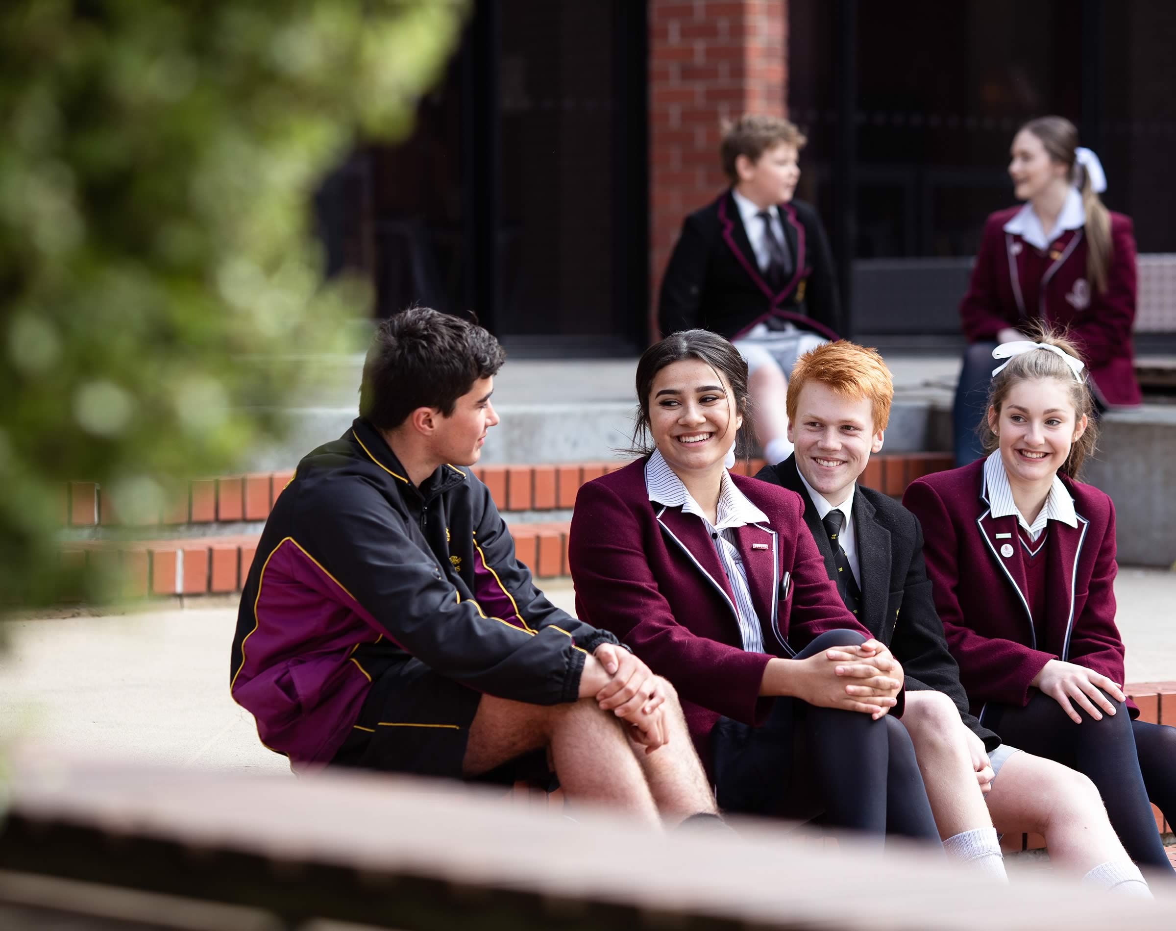 St Michael’s Collegiate and The Hutchins School students chatting in the Senior School Quad. Image: Joshua Lamont.